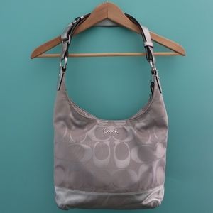 COACH- Silver CC Pattern w/Purple lining Bag